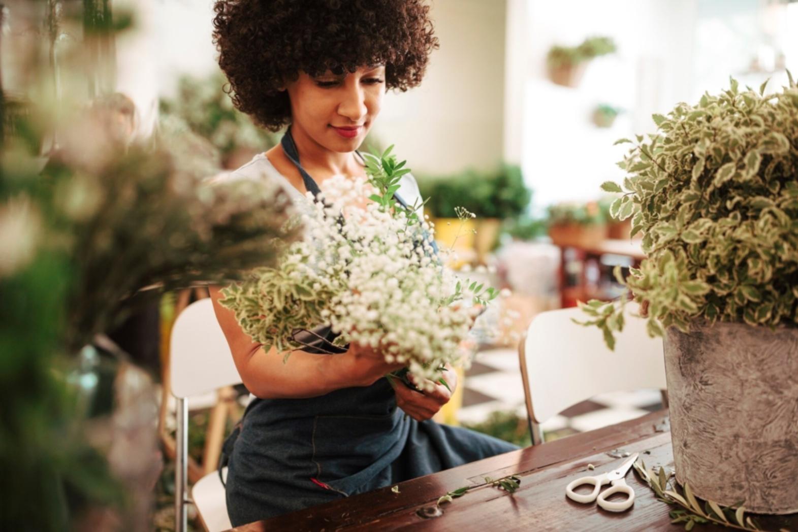 Our support team coordinating floral arrangements for a corporate event